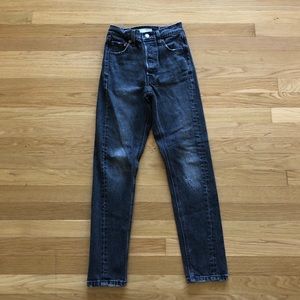 Black/grey distressed skinny Levi’s